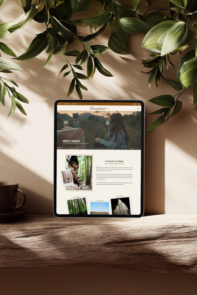 A tablet displays a nature-focused website beneath leafy vines, resting on a wooden table in warm sunlight; the scene feels calm and earthy.