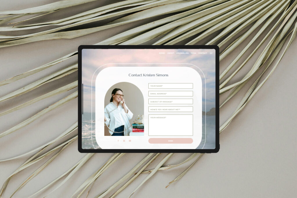Tablet displaying a contact form for Kristen Simons, with a smiling woman’s portrait, lies on dried palm leaves in a calm, neutral setting.