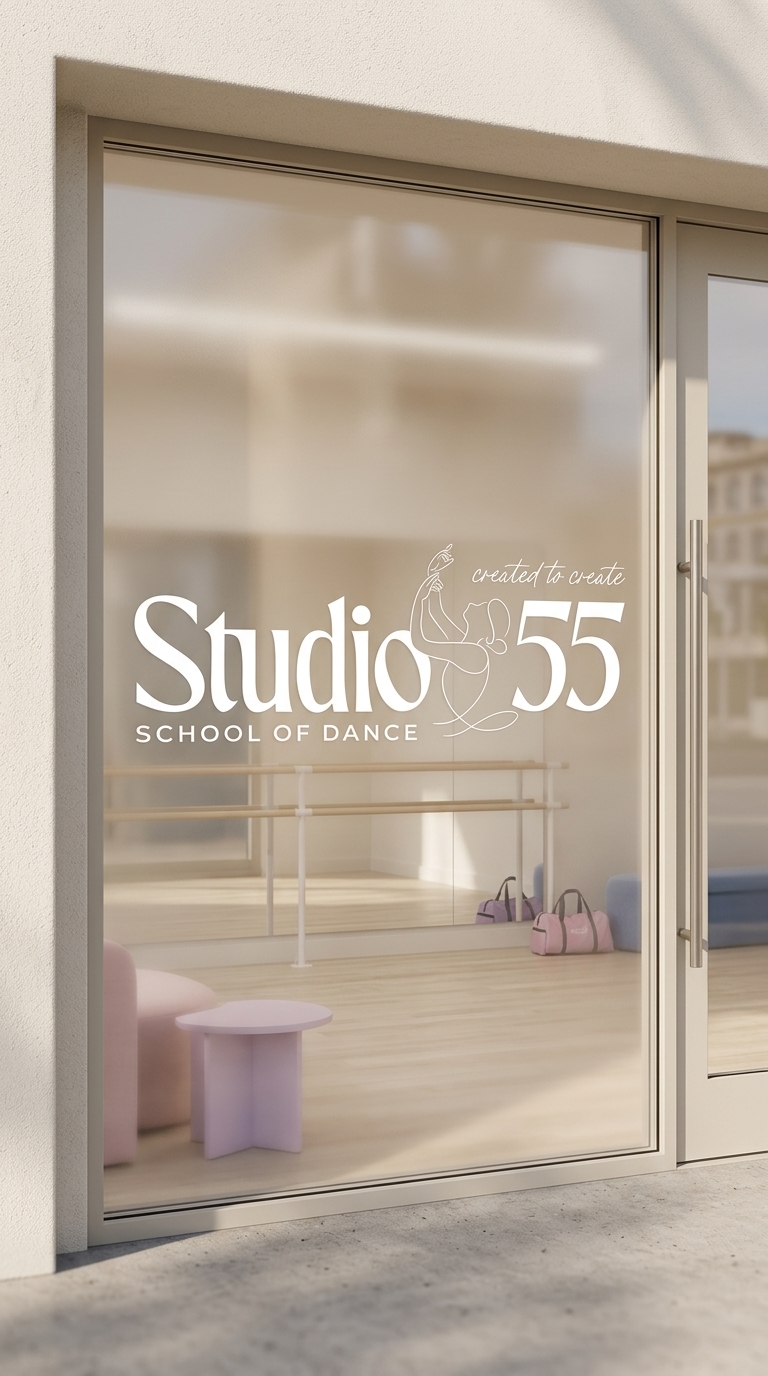 Glass dance studio door with “Studio 55 School of Dance” lettering, revealing a bright ballet room, barre, mirrors, and pastel furnishings.